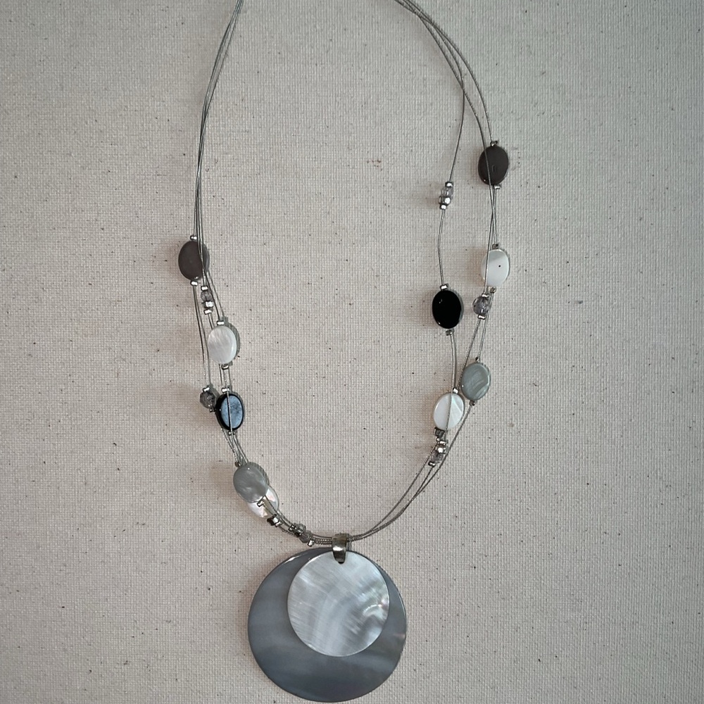 Modern Silver and Black Necklace with Circular Pendant